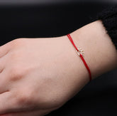 Bratara cu snur coronita aur 14k
